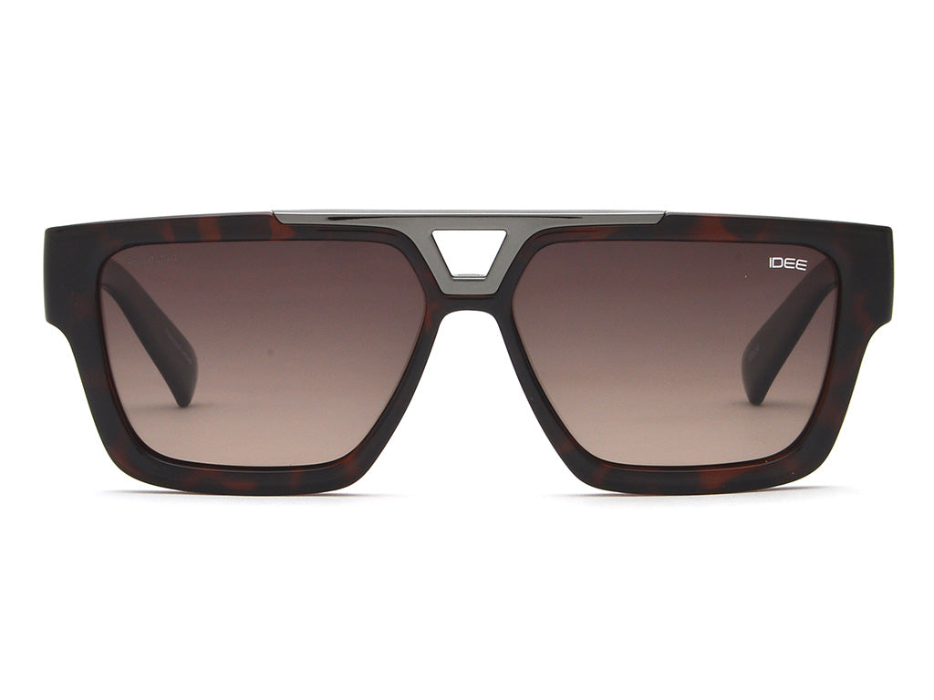 Sunglasses with a tortoiseshell frame and gradient lenses on a white background