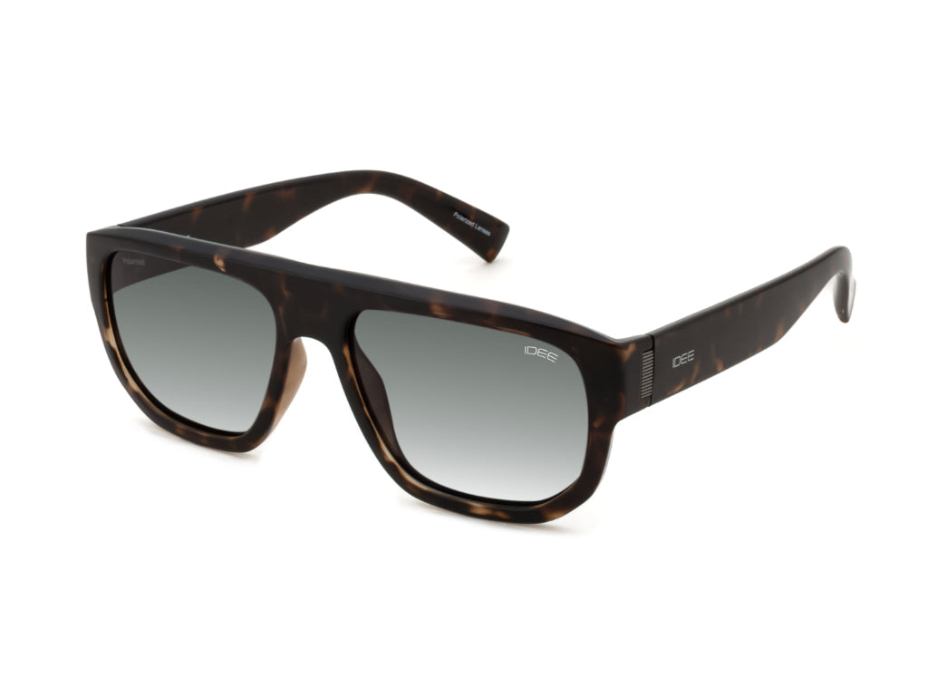 Sunglasses with tortoiseshell frame and gradient lenses on a white background