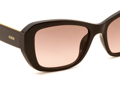 Sunglasses with a gold frame and pink-tinted lenses on a white background