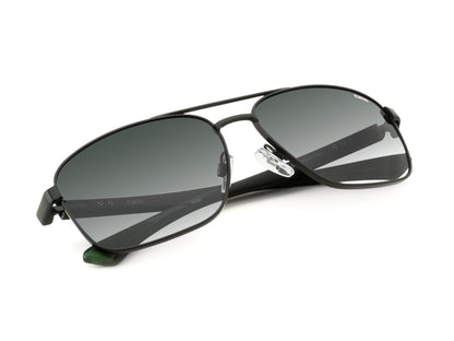 Aviator sunglasses with dark lenses on a white background
