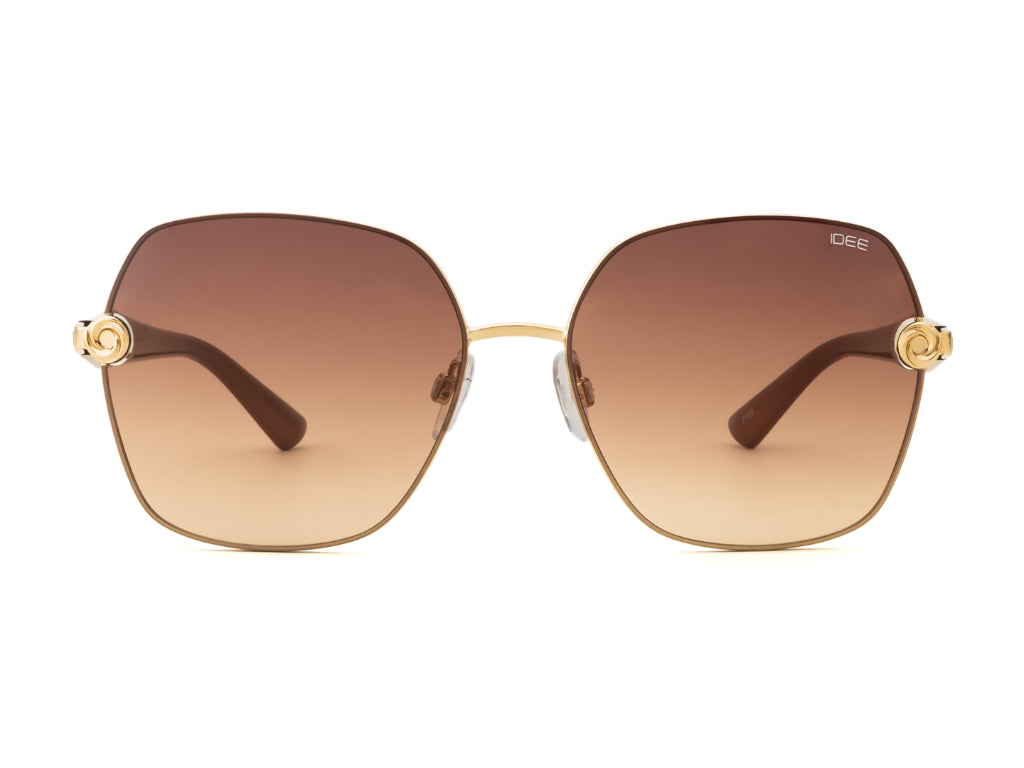 Sunglasses with gold frames and brown gradient lenses on a white background