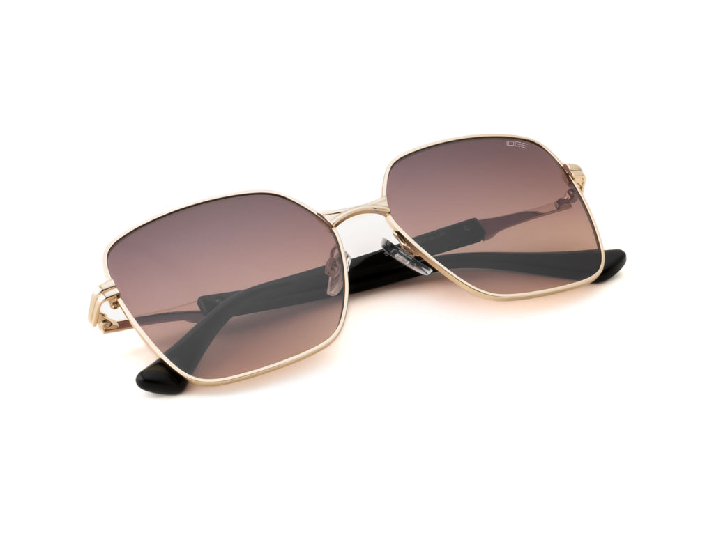 Gold-framed sunglasses with brown lenses on a white background