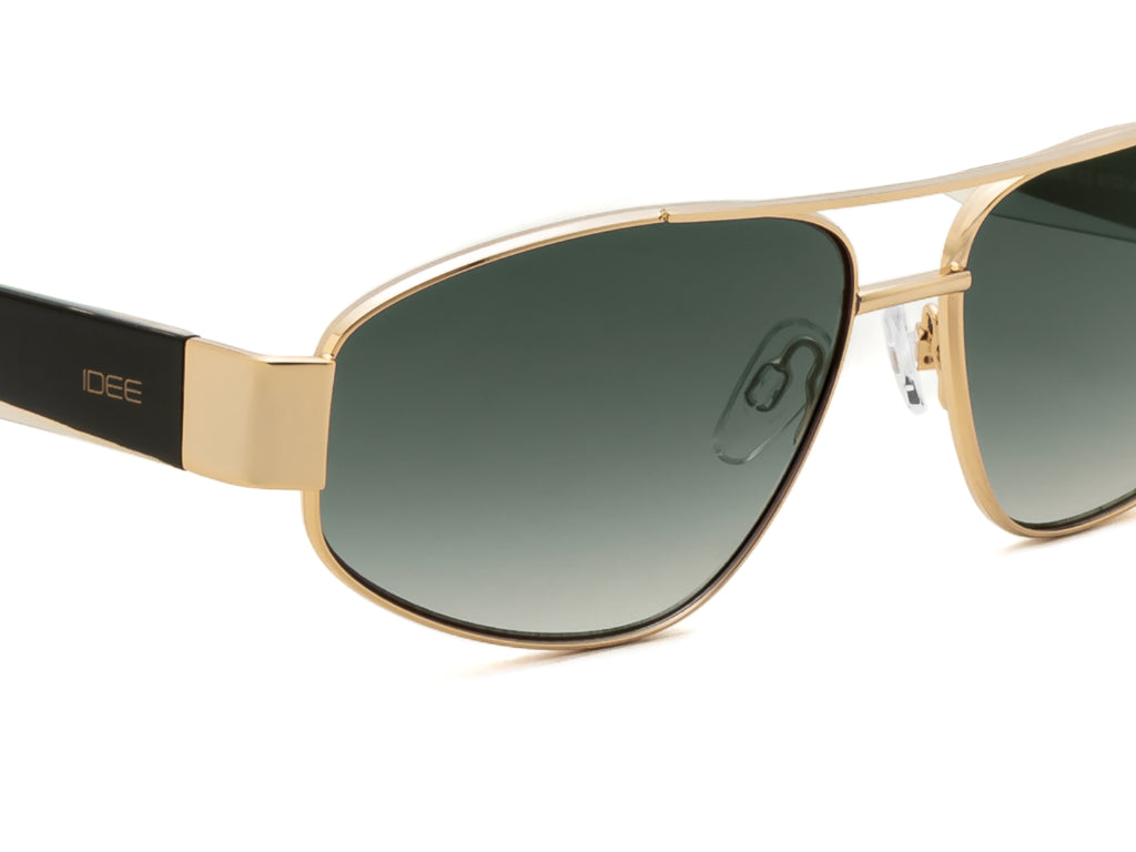 Gold-framed sunglasses with green gradient lenses on a white background