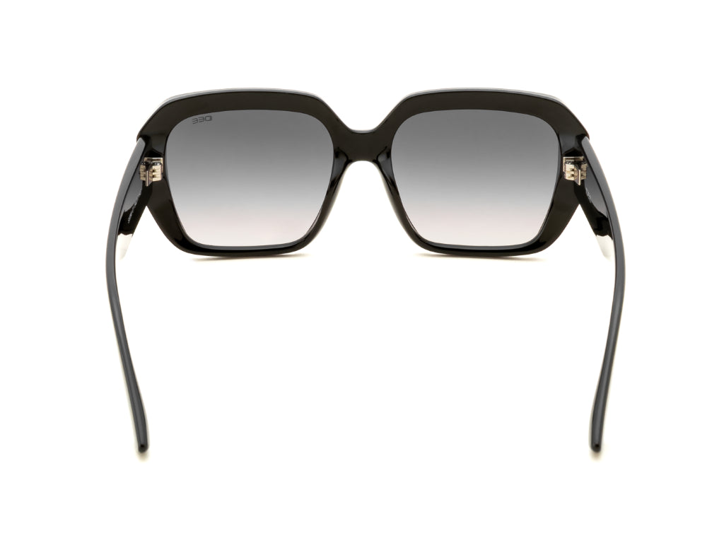 Black sunglasses with gradient lenses on a white background