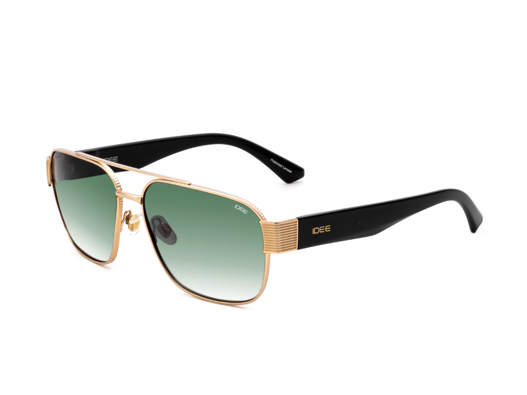 Sunglasses with gold frame and black arms on a white background