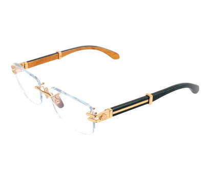 Eyeglasses with gold and black frame on a white background