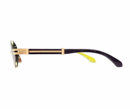 Sunglasses with gold frame and black arms on a white background