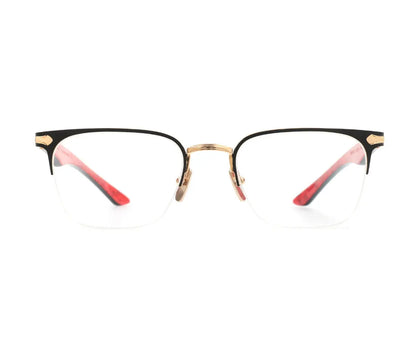 Eyeglasses with black, gold, and red frame on a white background