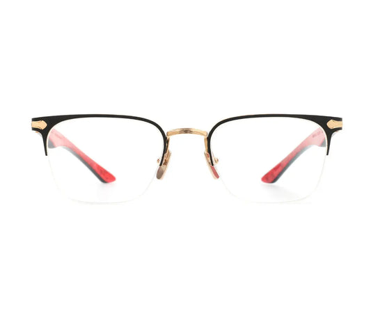 Eyeglasses with black, gold, and red frame on a white background