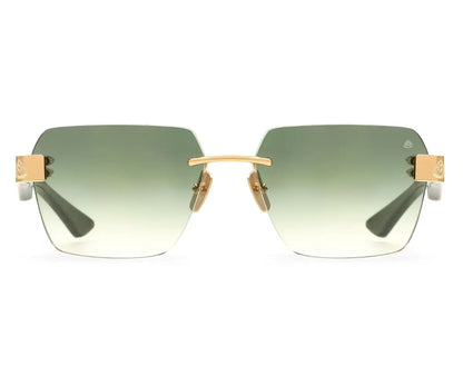 Sunglasses with gold frame and green gradient lenses on a white background