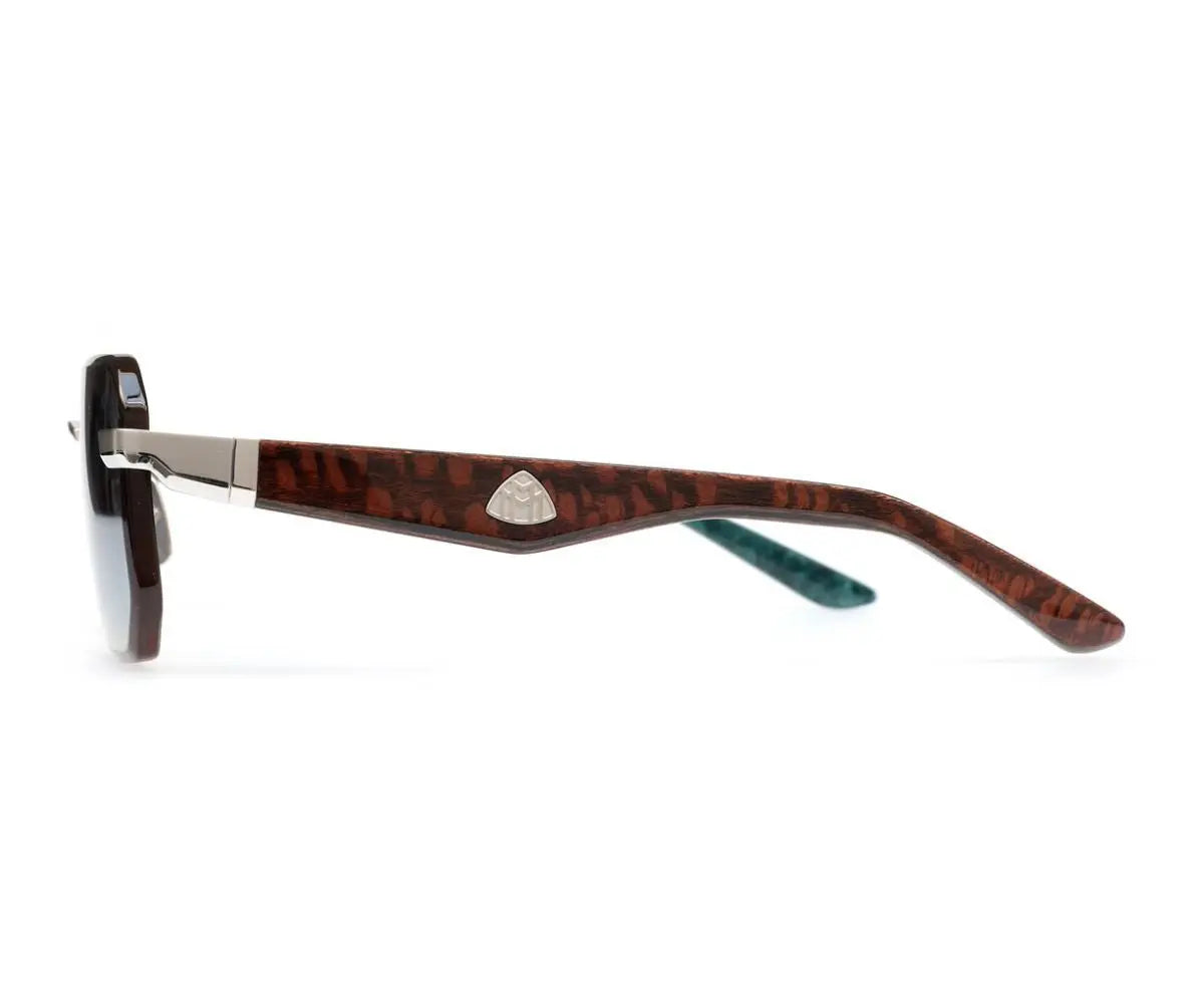 Sunglasses with tortoiseshell frame and reflective lenses on a white background