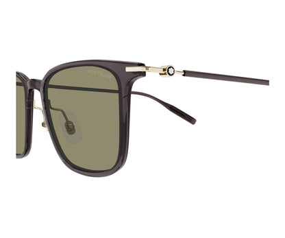 Sunglasses with dark frame and green lenses on a white background