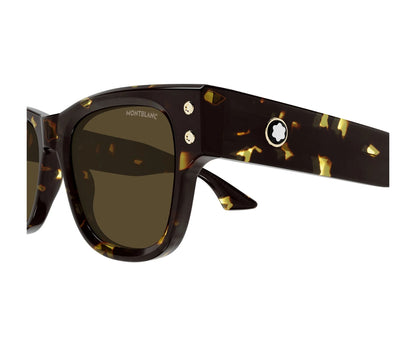 Sunglasses with tortoiseshell frame and dark lenses on a white background