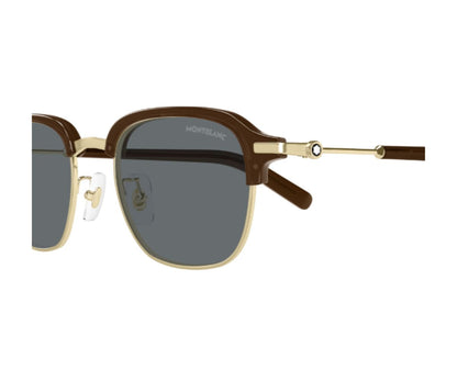 Sunglasses with brown and gold frame on a white background