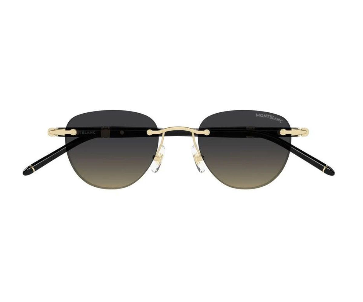 Sunglasses with black gradient lenses and gold frames on a white background