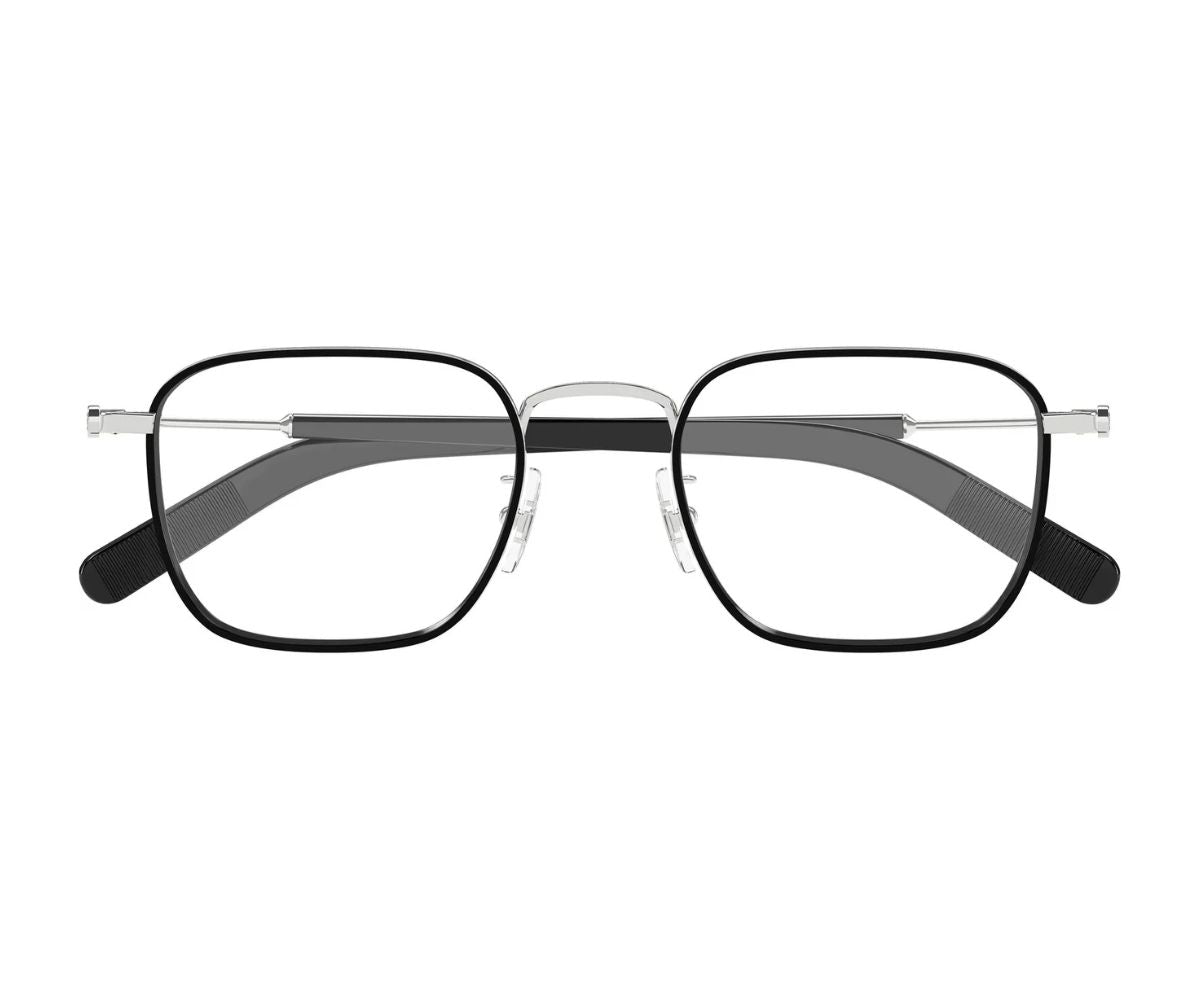 Black eyeglasses with thin metal frame on a white background