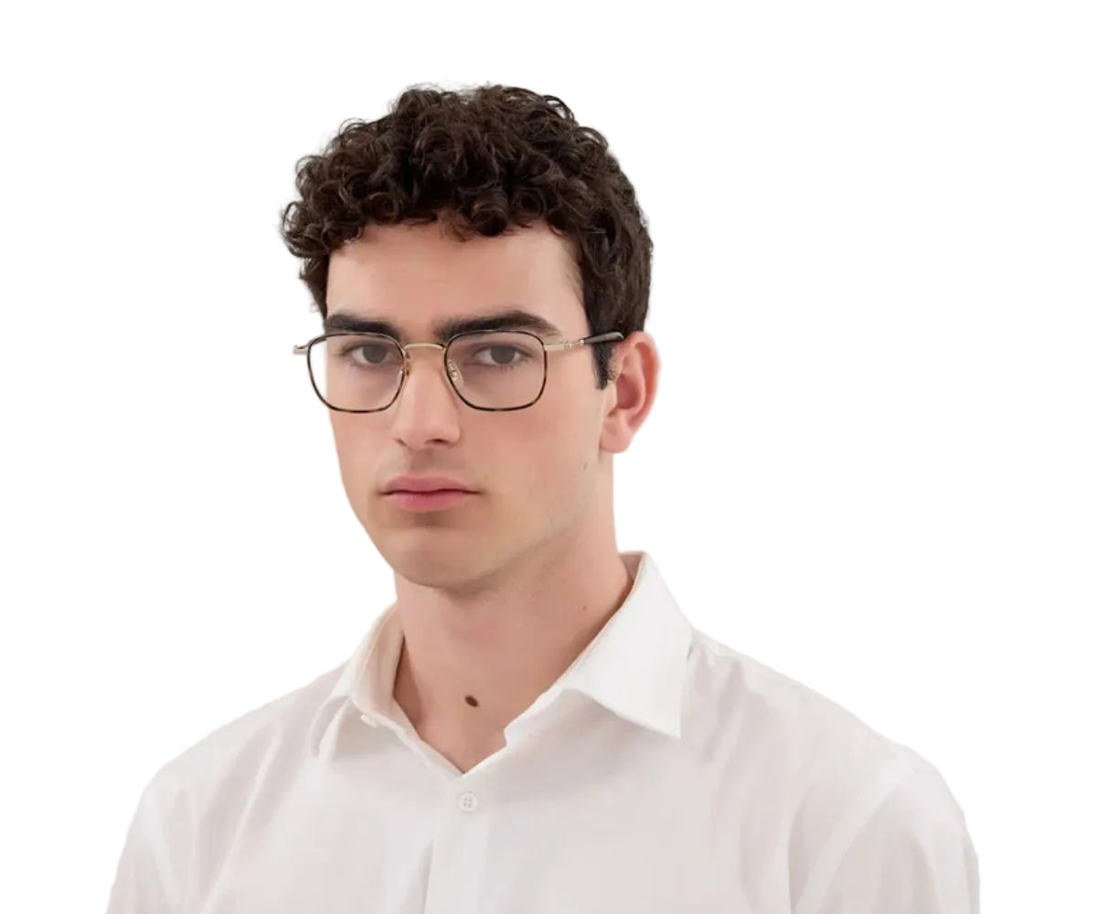Man wearing glasses and a white shirt on a white background