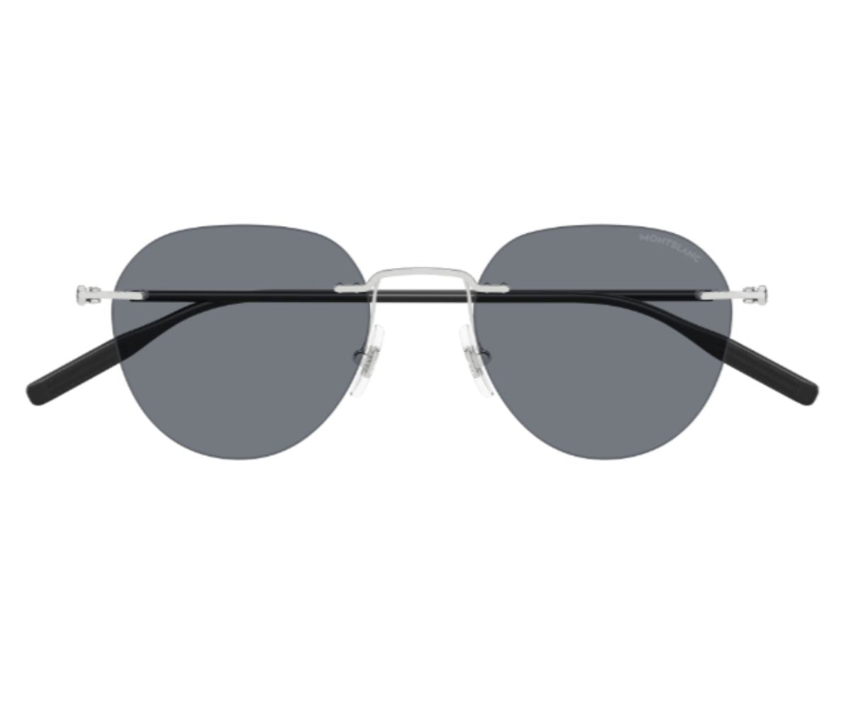 Round sunglasses with dark lenses and black arms on a white background