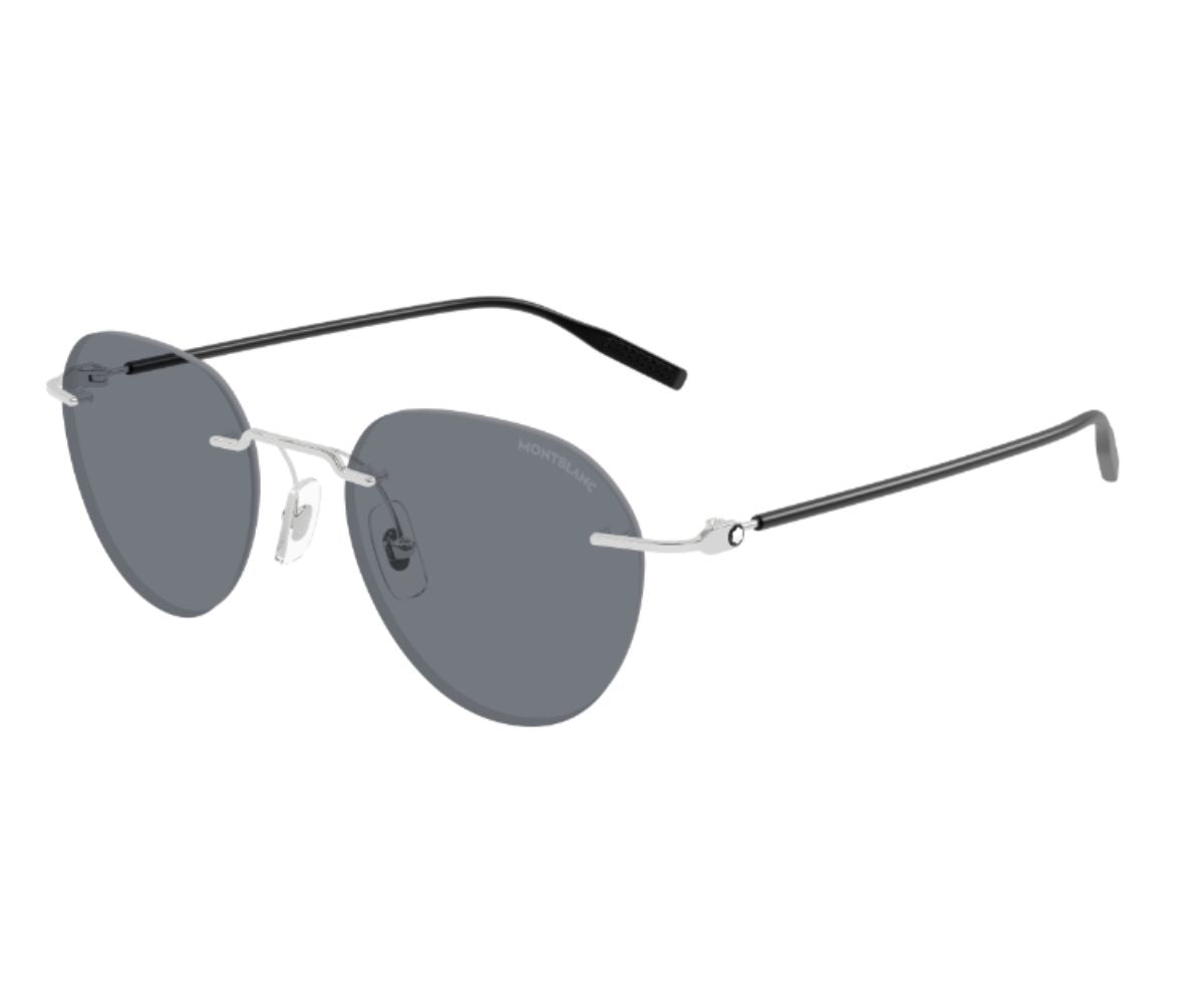 Sunglasses with dark lenses and thin metal frame on a white background