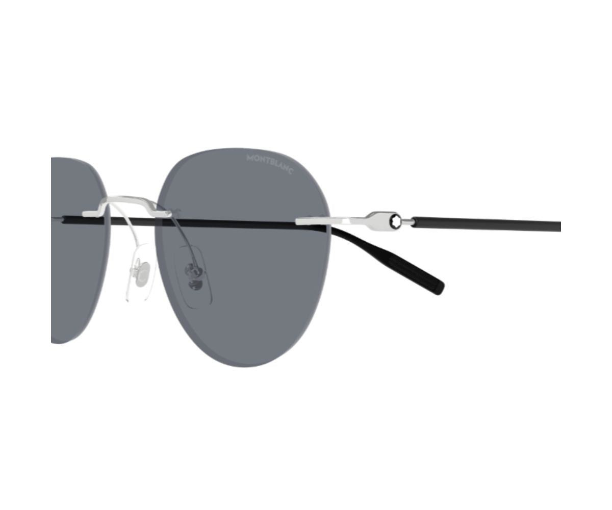 Sunglasses with dark lenses and thin frame on a white background