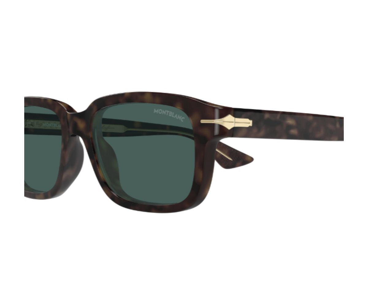 Sunglasses with tortoiseshell frame and green lenses on a white background