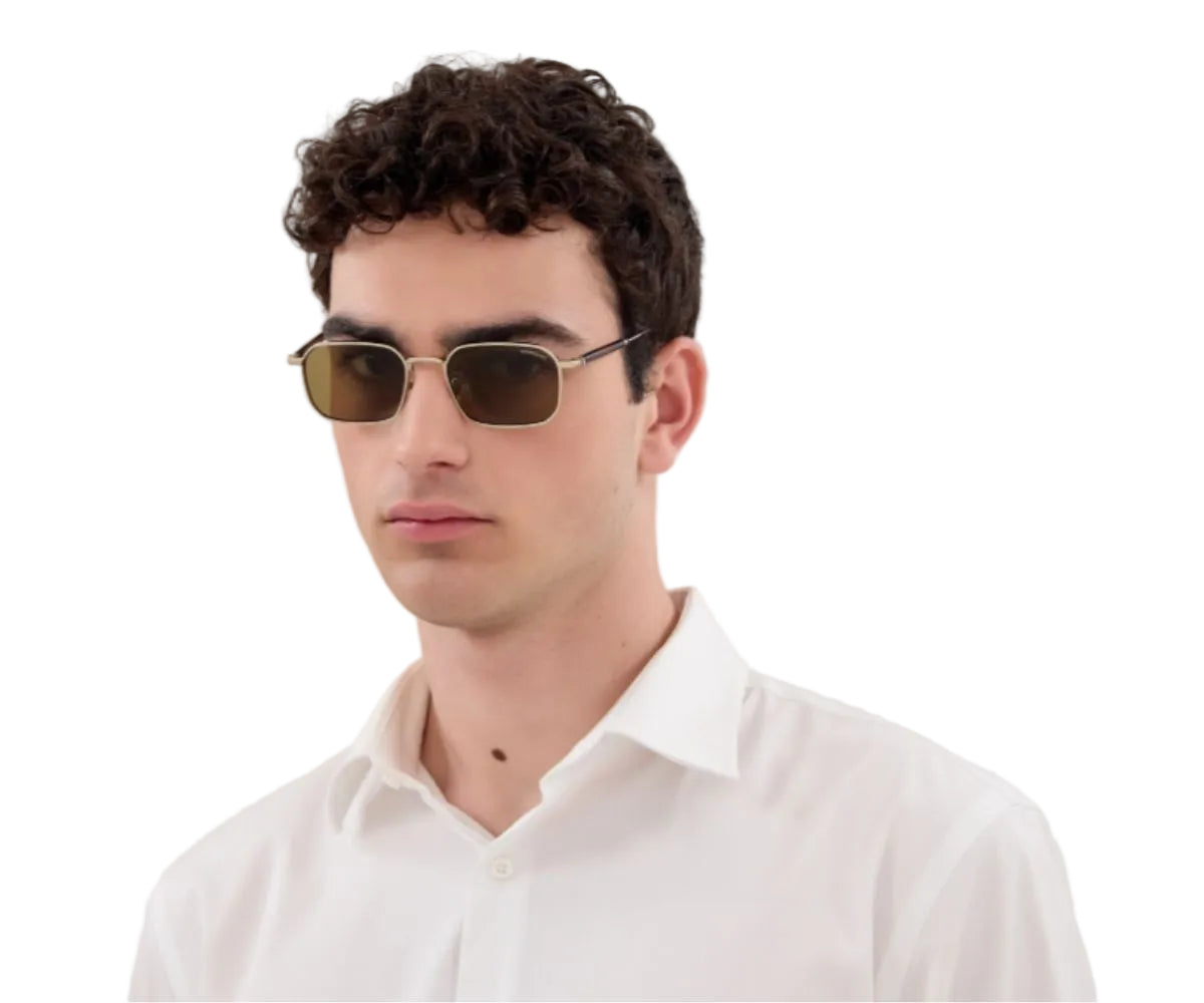 Man wearing sunglasses and a white shirt on a white background