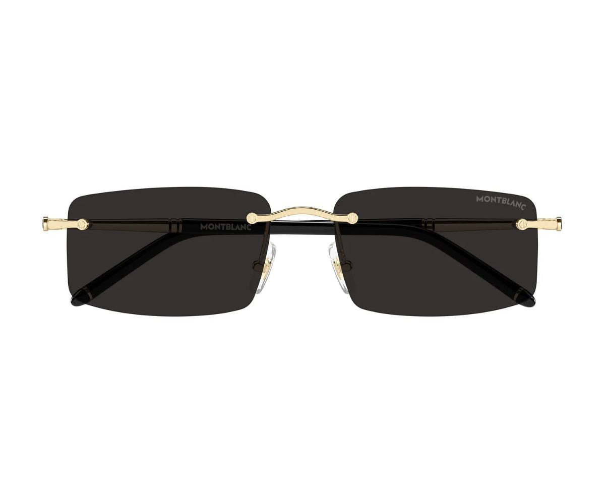 Sunglasses with gold frame and black lenses on a white background