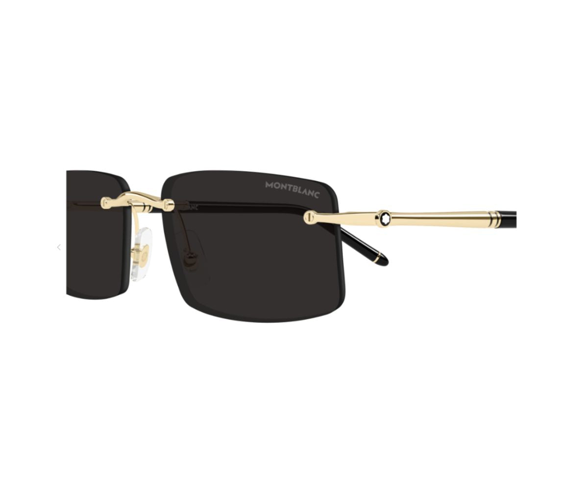 Sunglasses with gold frame and black lenses on a white background