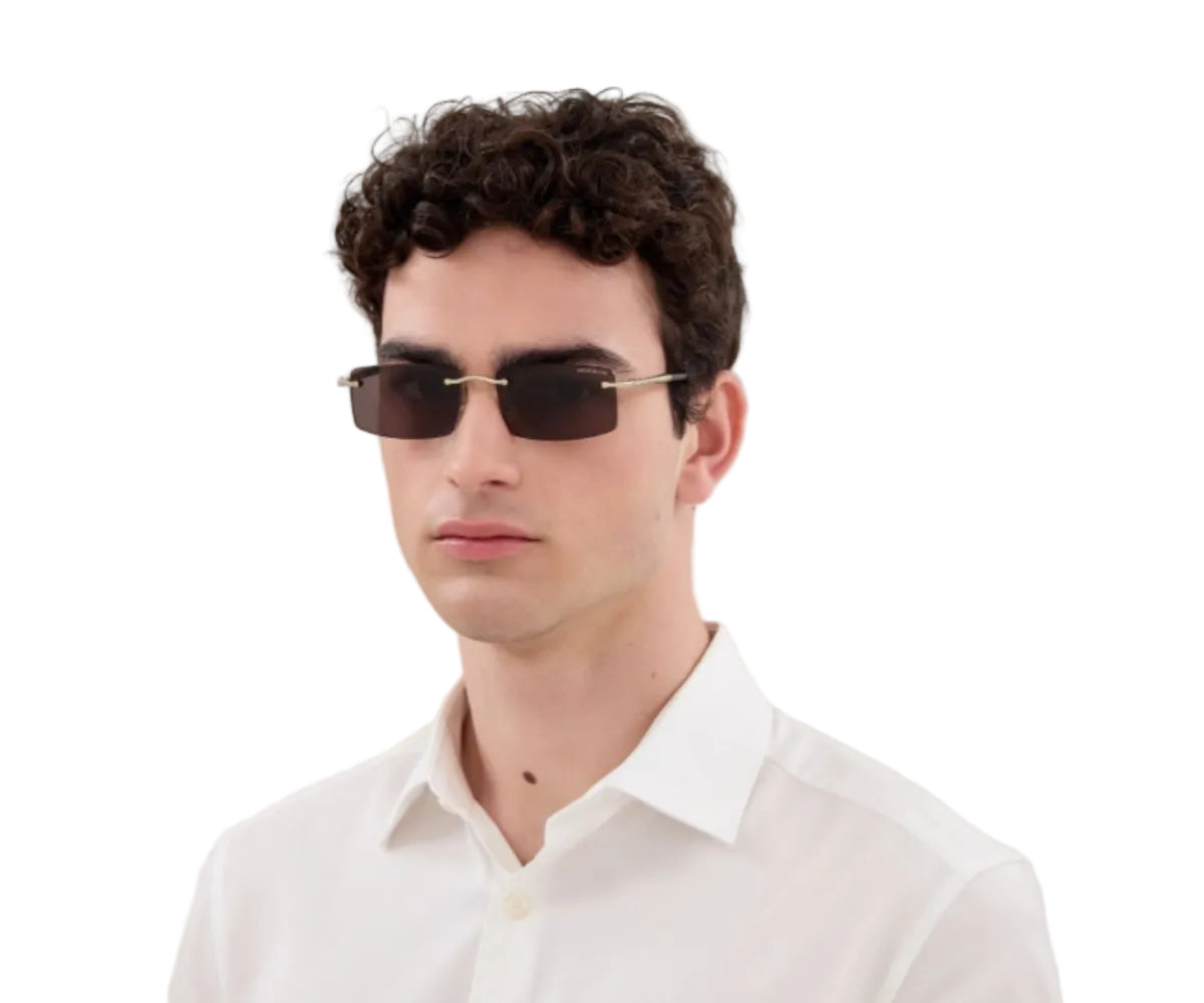 Man wearing sunglasses and a white shirt on a white background