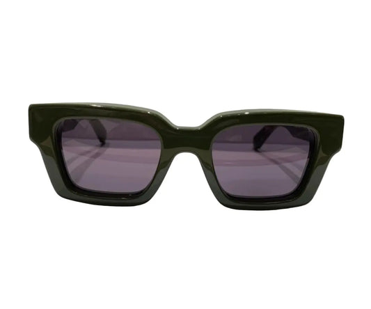 Green sunglasses with dark lenses on a white background