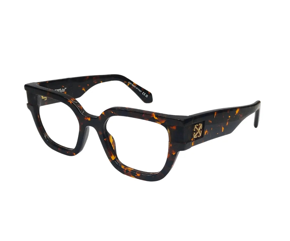 Black and orange tortoiseshell eyeglasses on a white background