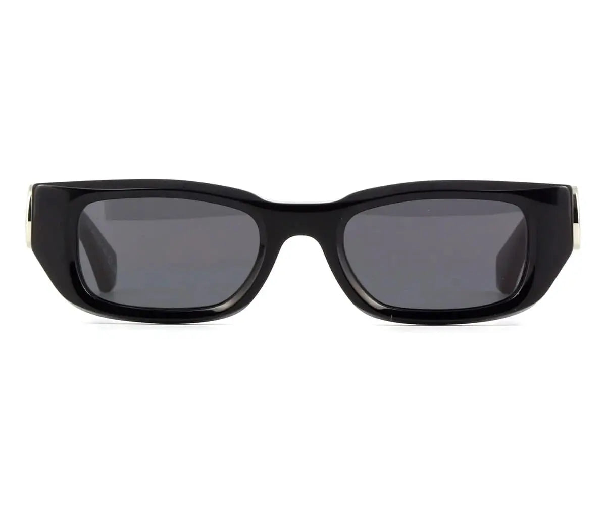 Black sunglasses with dark lenses on a white background