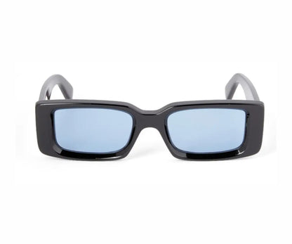 Black sunglasses with light blue lenses on a white background