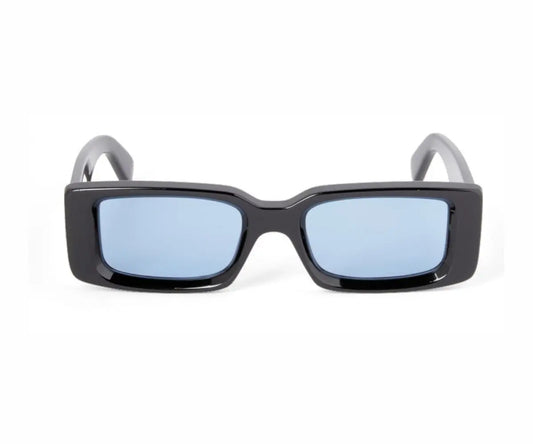 Black sunglasses with light blue lenses on a white background