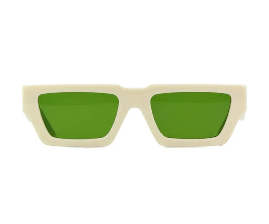 Sunglasses with green lenses and beige frame on a white background