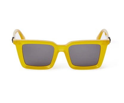 Yellow sunglasses with gray lenses on a white background