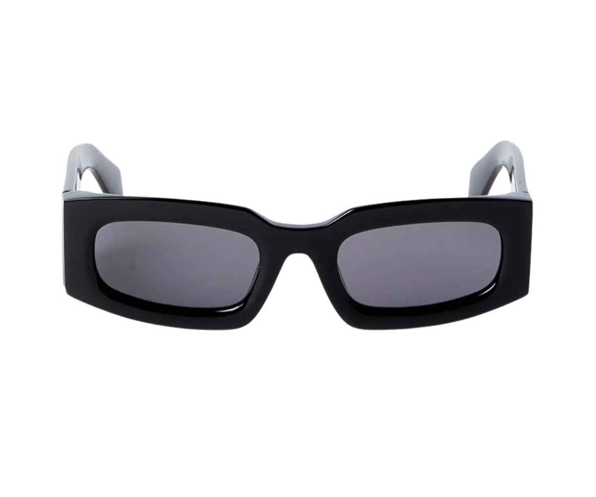 Black sunglasses with gray lenses on a white background