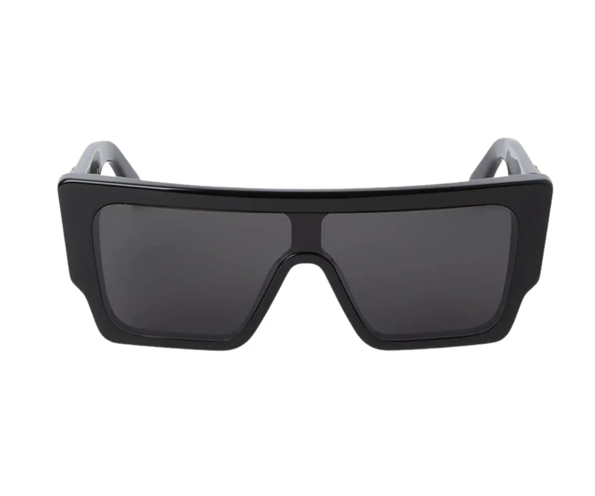 Black sunglasses with a wide frame on a white background
