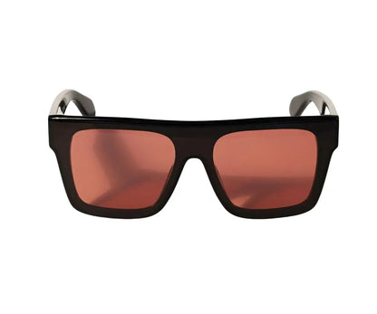Sunglasses with black frame and red-tinted lenses on a white background