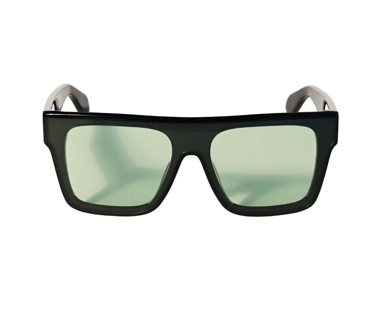 Black sunglasses with green lenses on a white background