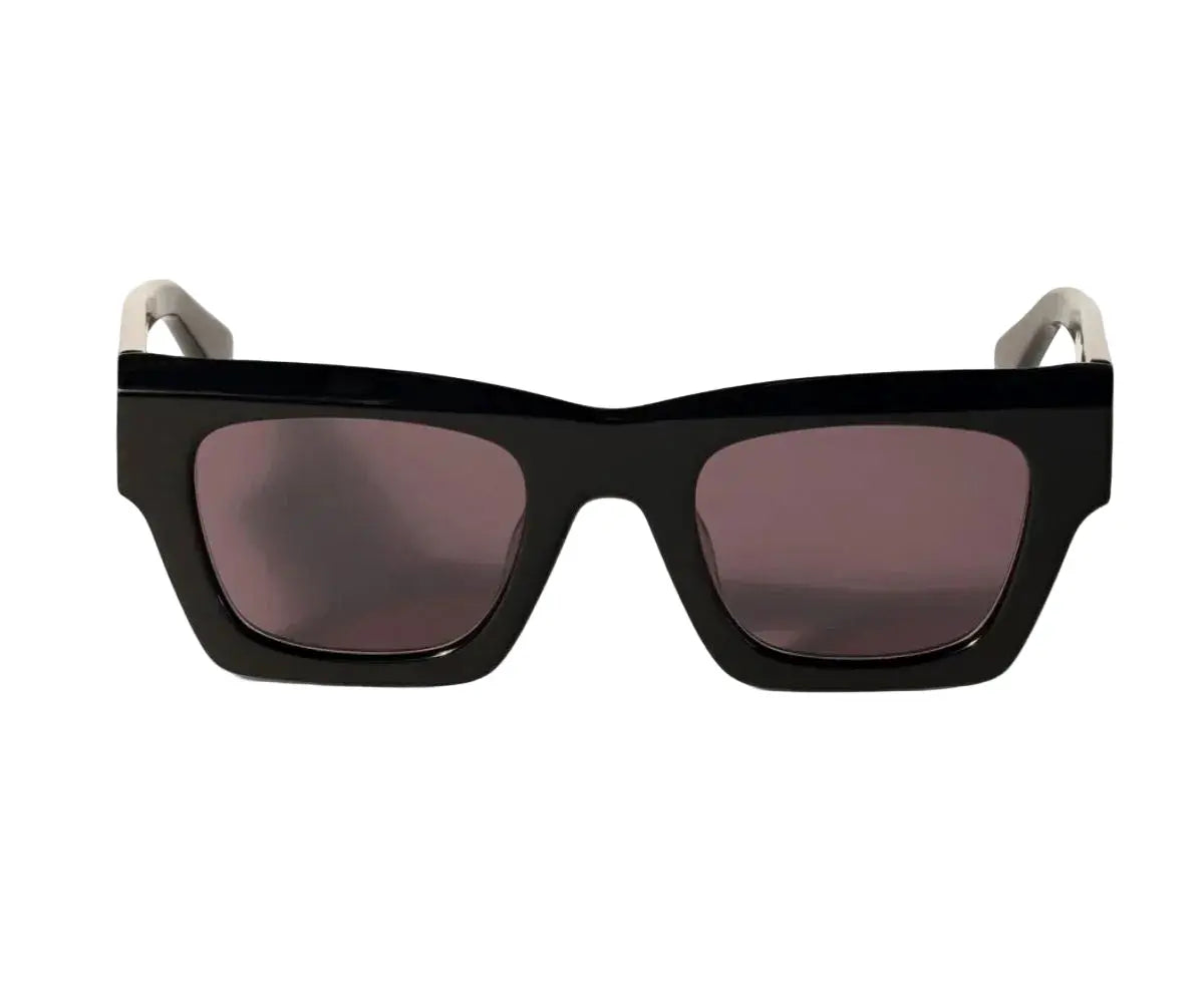 Black sunglasses with a white frame on a white background