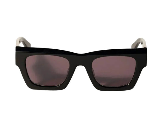 Black sunglasses with a white frame on a white background