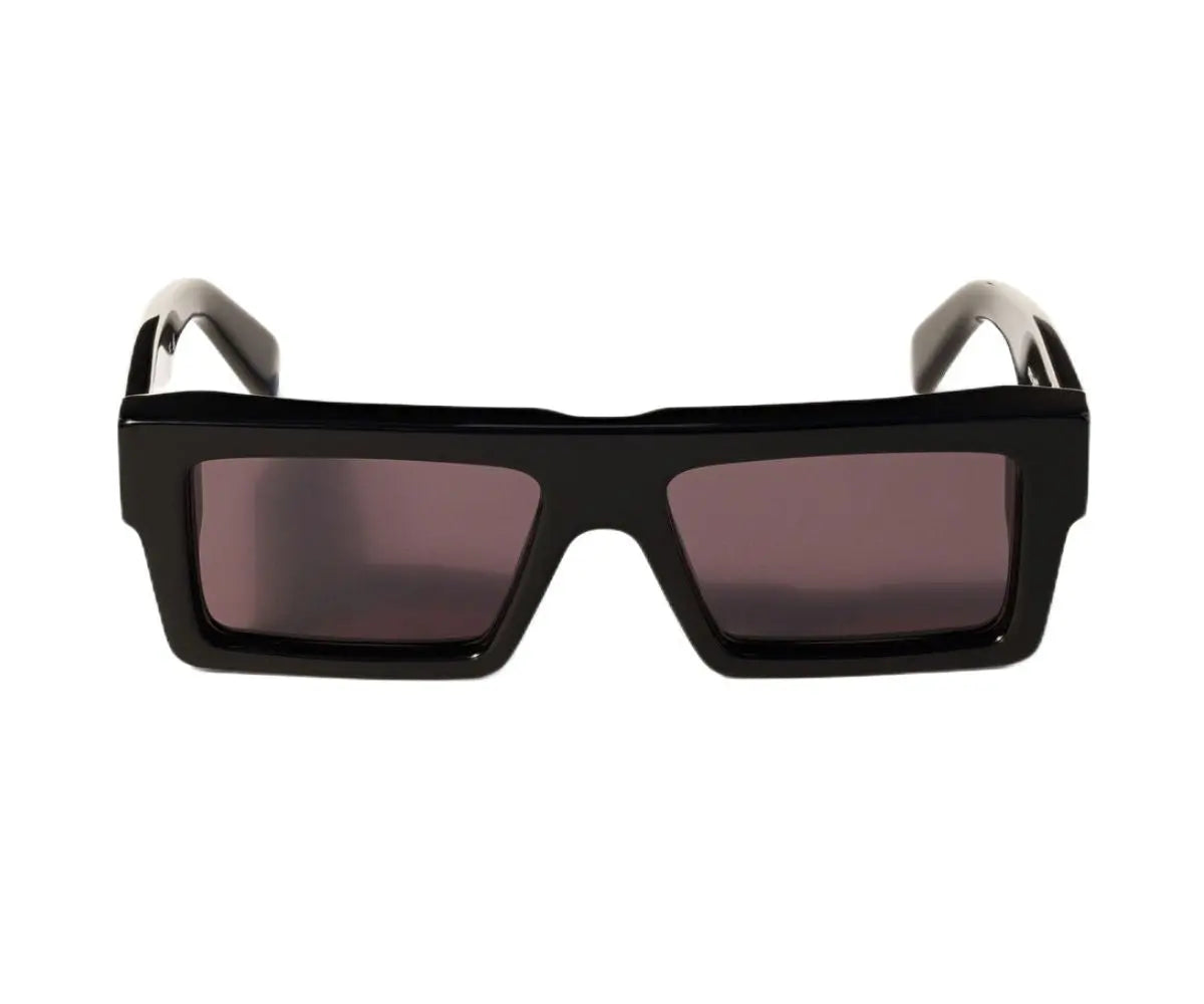 Black sunglasses with dark lenses on a white background