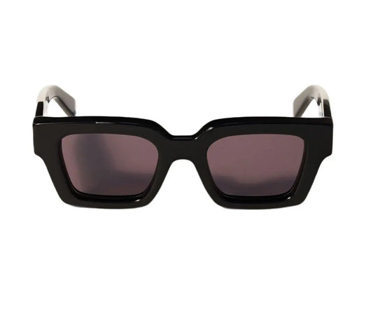 Black sunglasses with a white frame on a white background