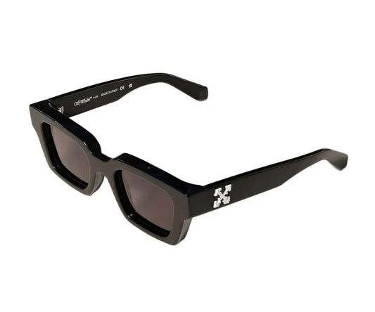 Black sunglasses with a brand logo on a white background
