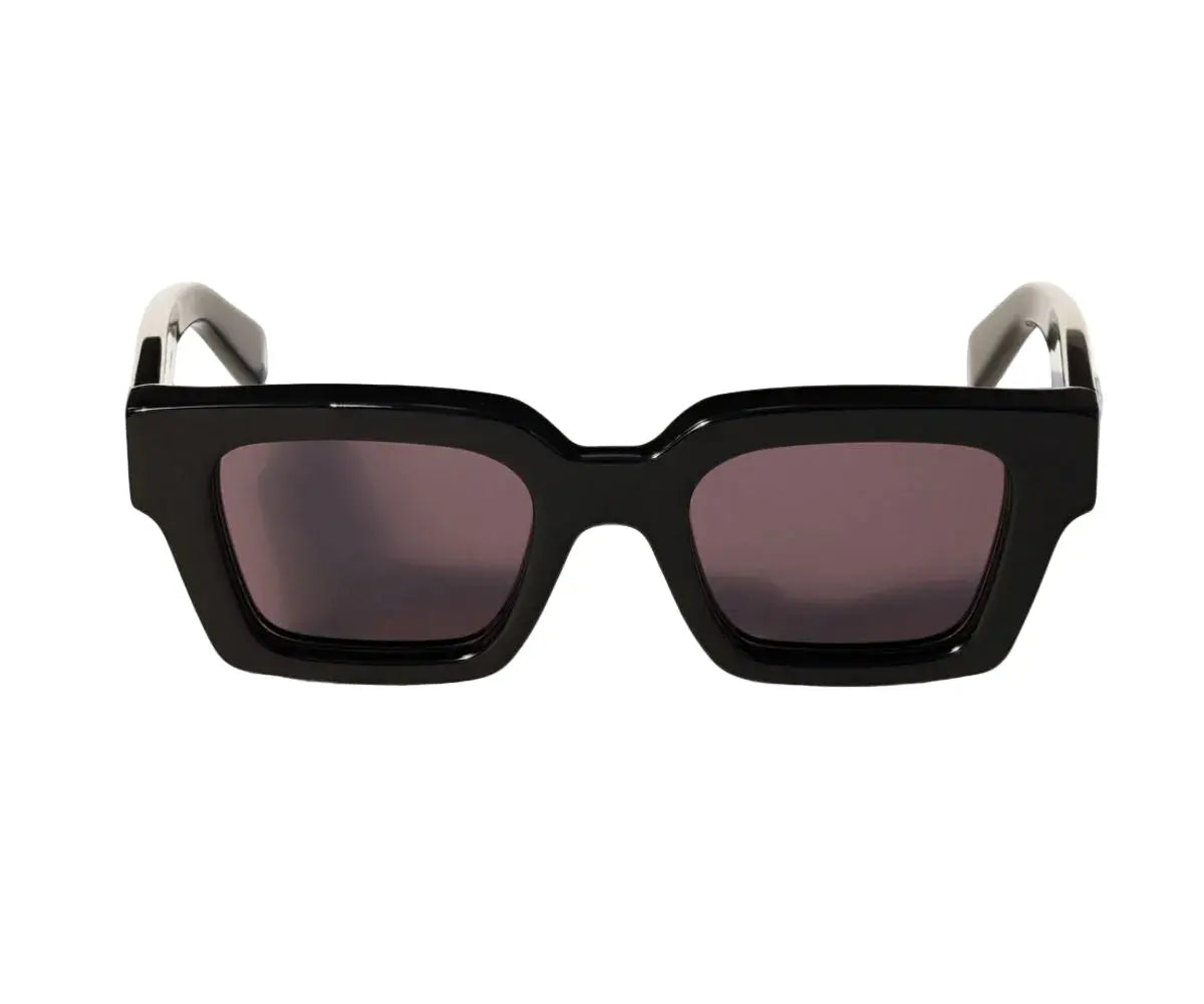 Black sunglasses with a white frame on a white background