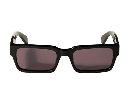 Black sunglasses with dark lenses on a white background