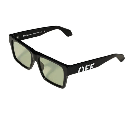 Black sunglasses with green lenses on a white background