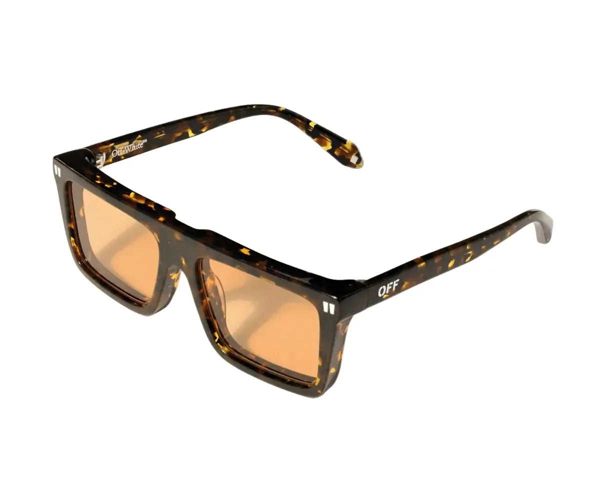 Sunglasses with tortoiseshell frame and orange lenses on a white background