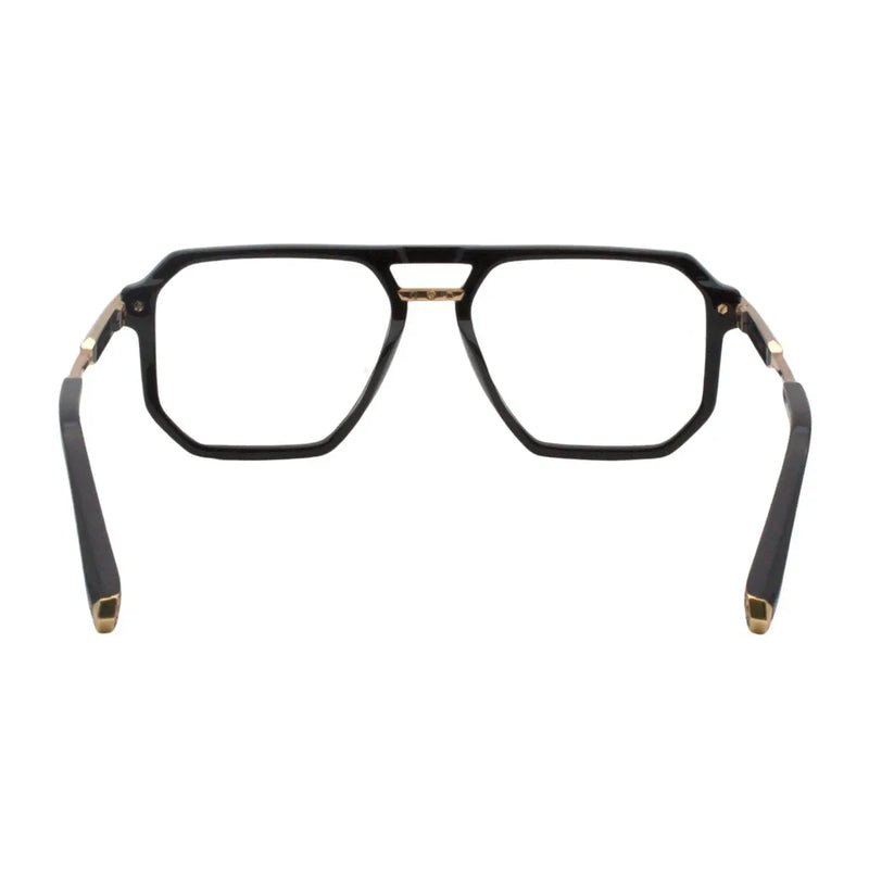 Black eyeglasses with gold accents on a white background